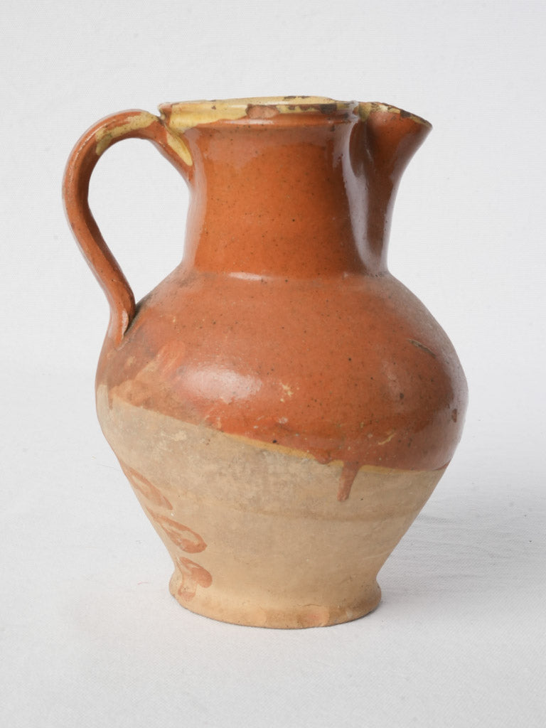 Traditional buff clay pitcher  