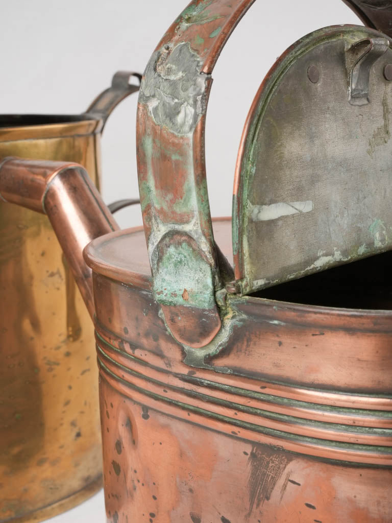 Collection of 4 copper watering cans