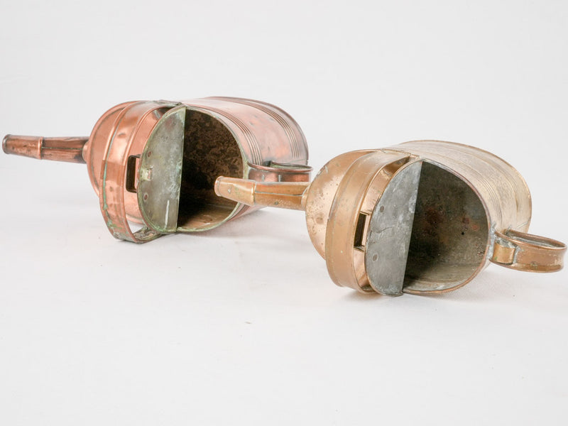 Collection of 4 copper watering cans
