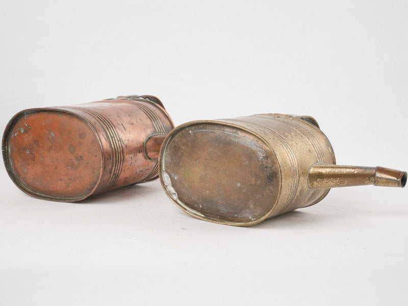 Collection of 4 copper watering cans