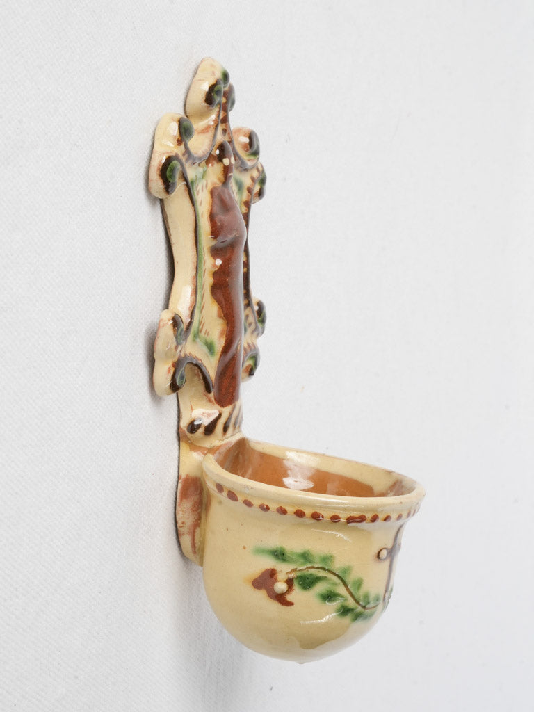 Vintage polychrome religious font  