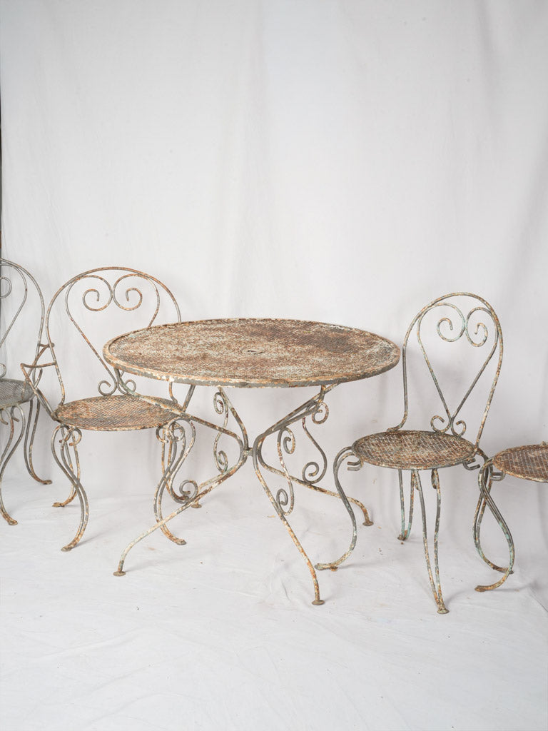1960s French Wrought Iron Garden Suite w/ Graceful Curves and Layered Patina