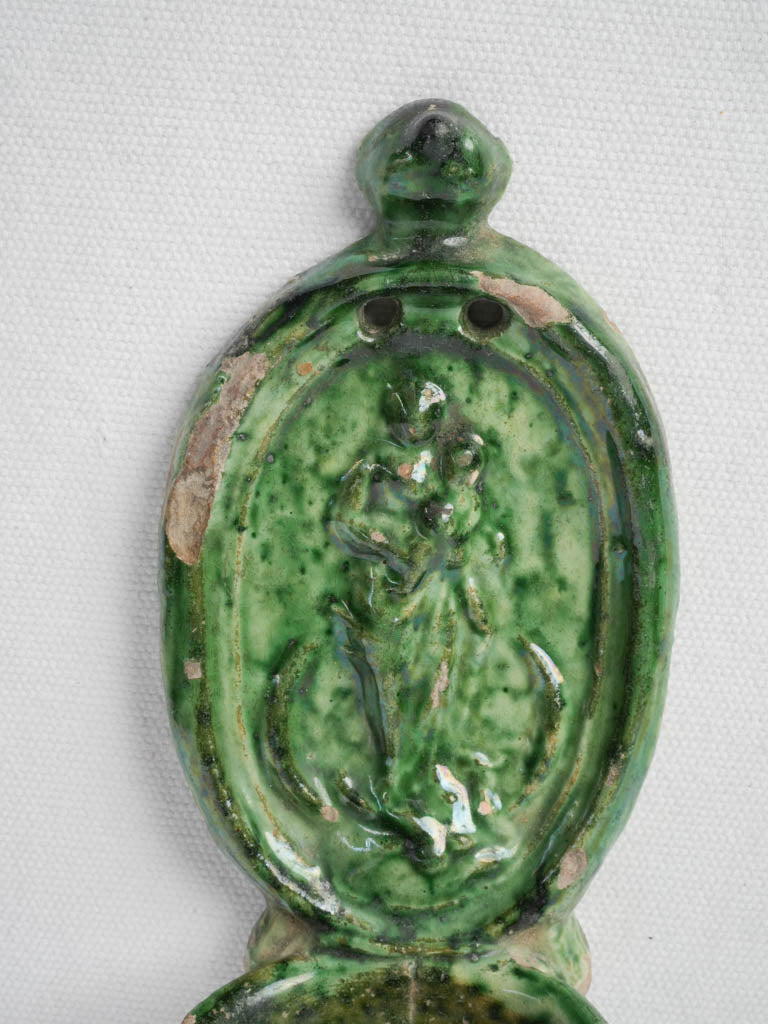 Mottled green devotional relief plaque