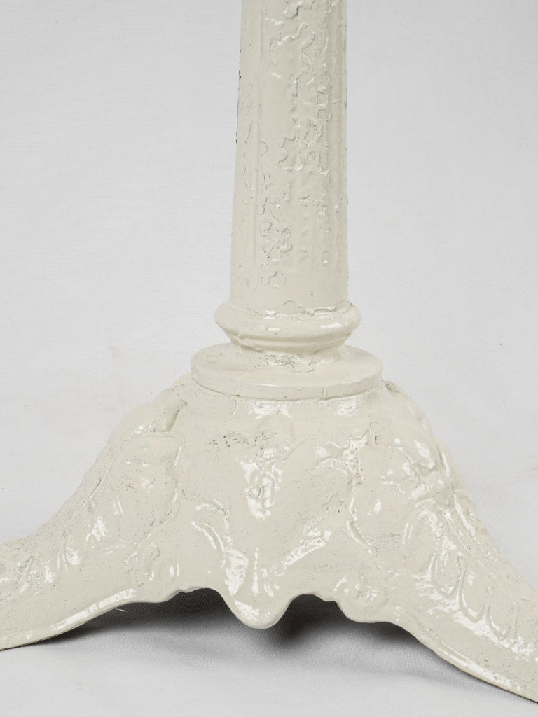 Rustic white outdoor cast iron table