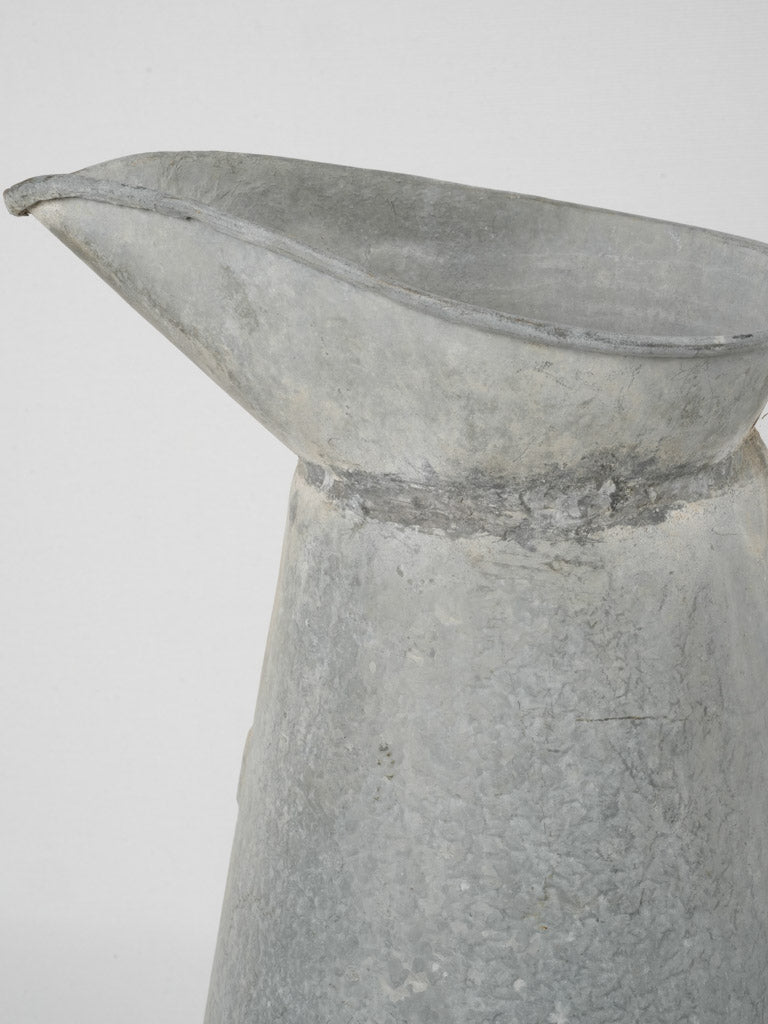 Graceful, aged French zinc vessel