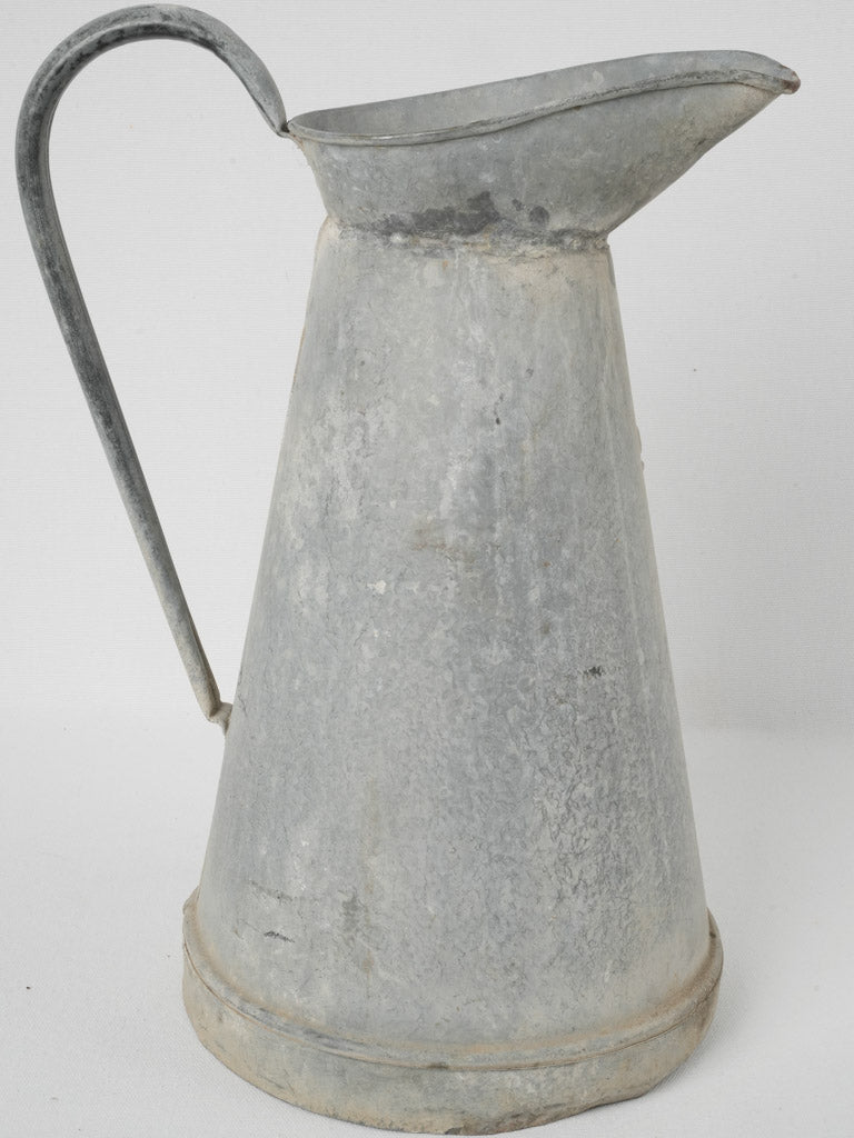 Timeworn, rustic antique zinc vessel