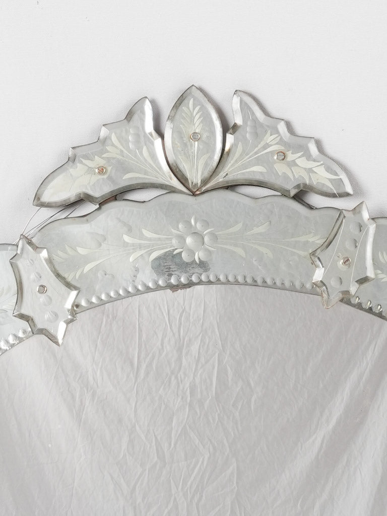Time-worn elegant Venetian mantle mirror