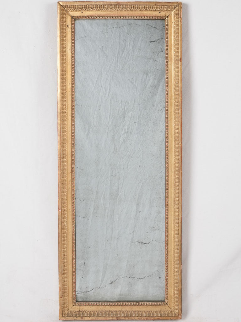 Antique gilded Louis XVI-style mirror