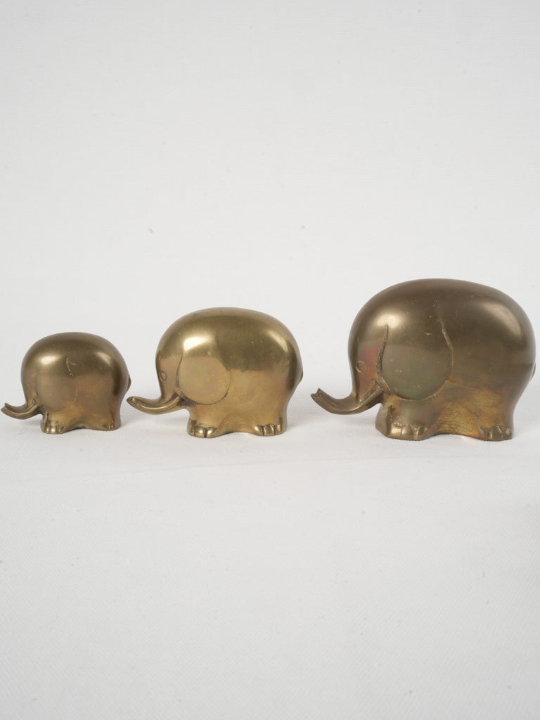 Playful character brass paperweights