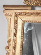 Gilded Louis XVI mirror w/ dragon pediment 63¾" x 29¼"