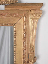 Gilded Louis XVI mirror w/ dragon pediment 63¾" x 29¼"