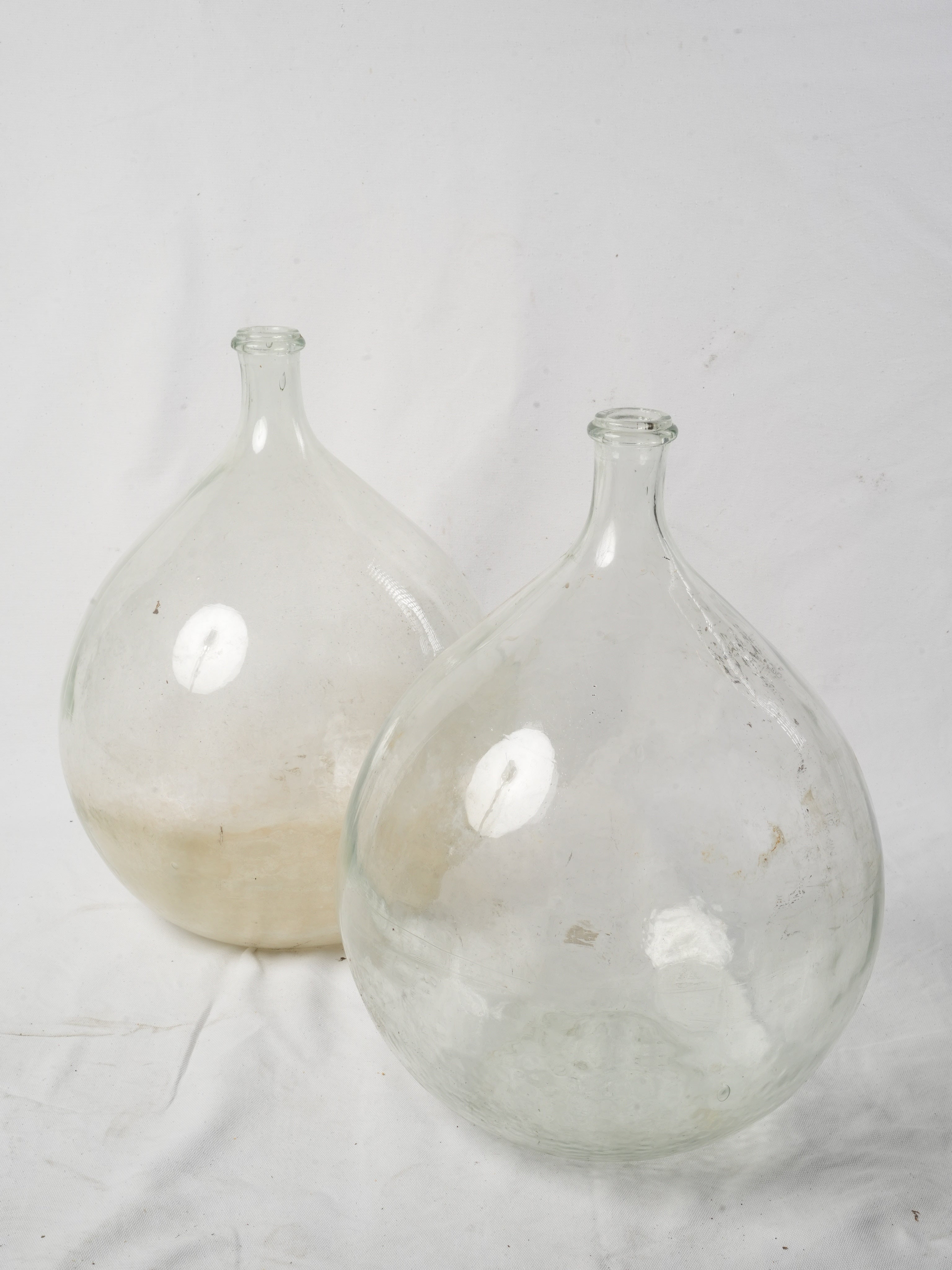 Vintage clear glass demijohns
