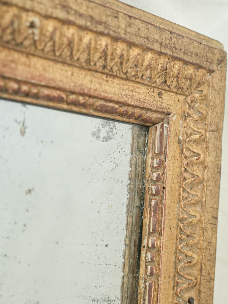 Understated neoclassical period mirror