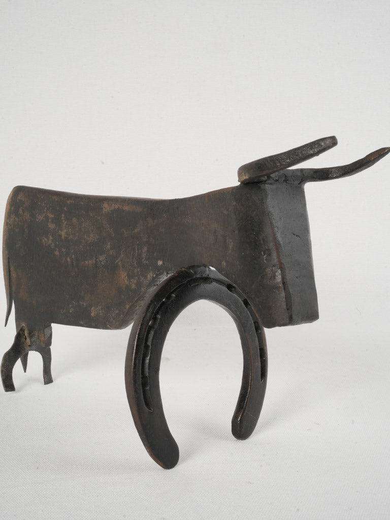 Unrefined vintage iron bull artwork  