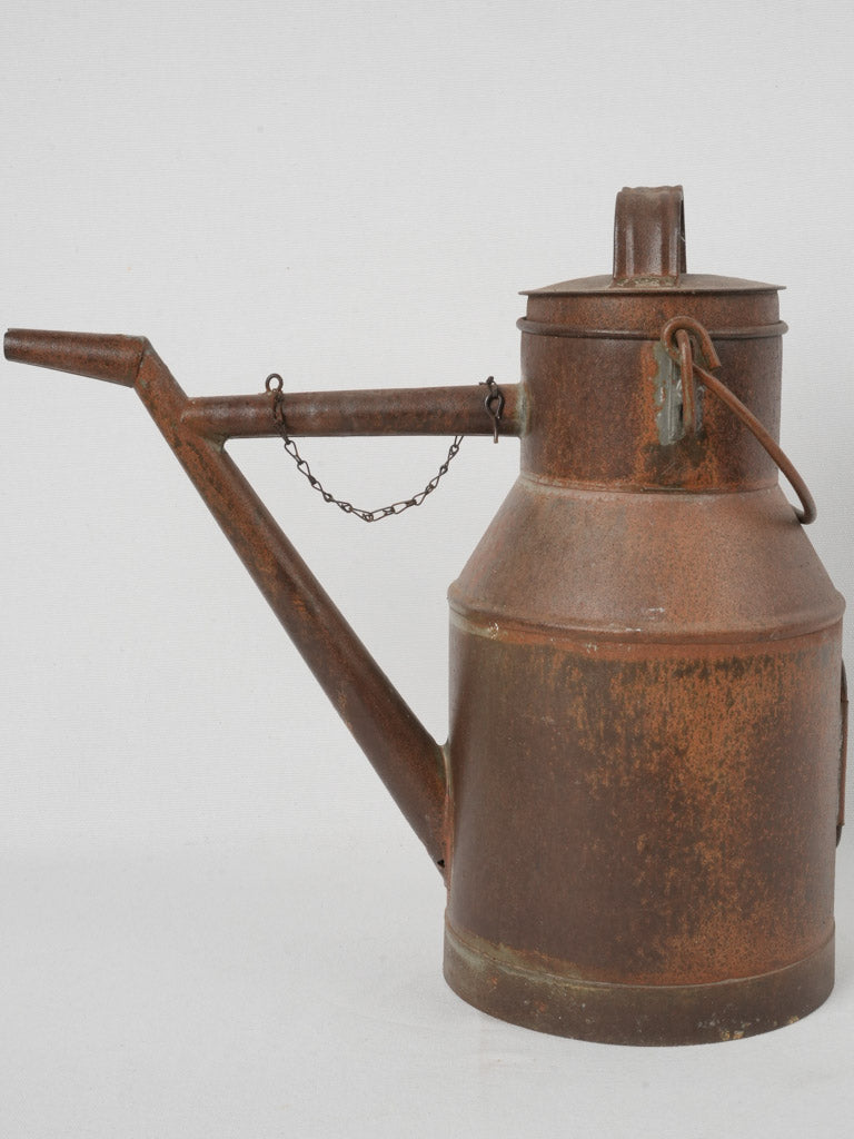 Antique weathered French iron watering