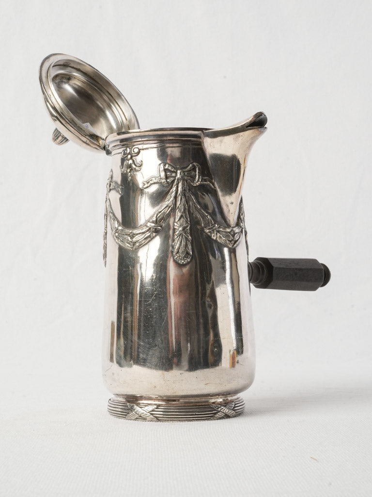 Elegant ribbon-adorned coffee pot  
