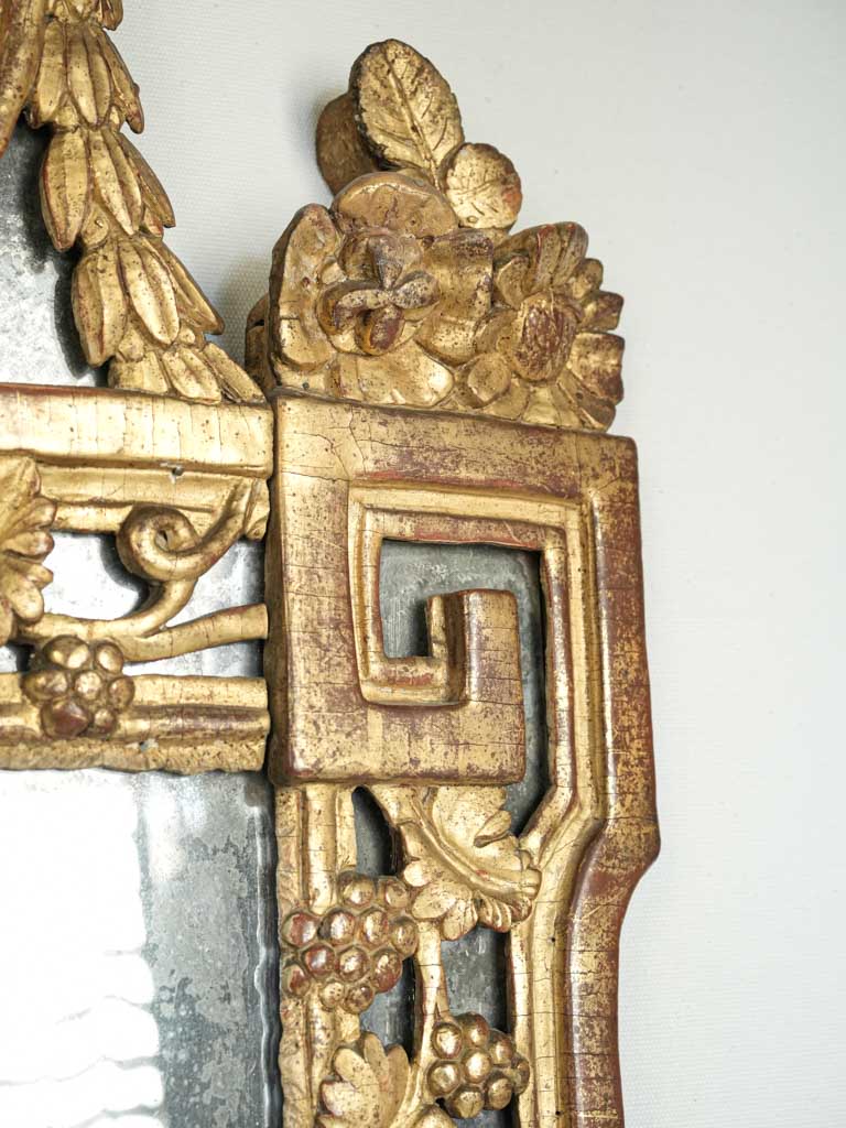 Historical floral crest mirror