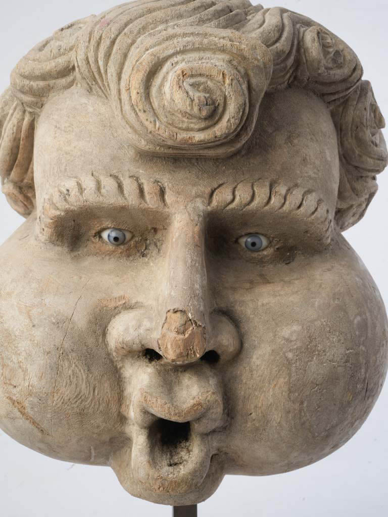 Grotesque carved cork figure