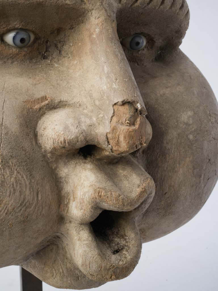 Spiraled-curls grotesque head