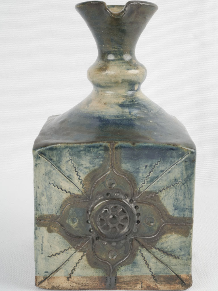 Classic blue-glazed pitcher ceramic piece