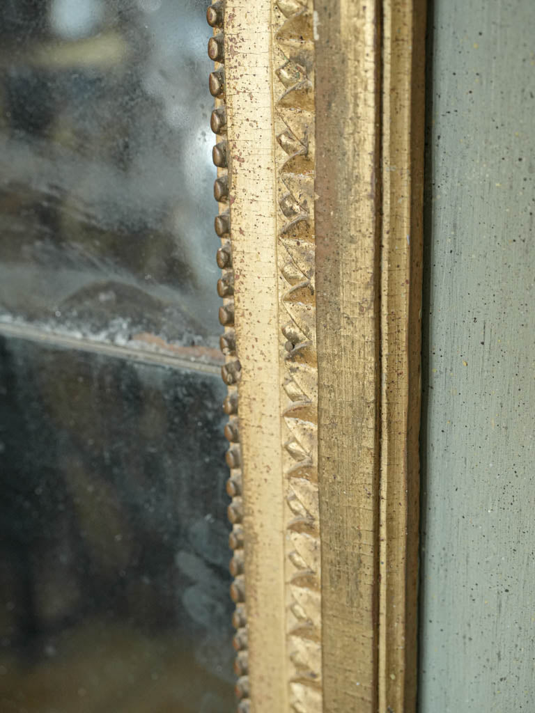 Delicate foxed mirror trumeau