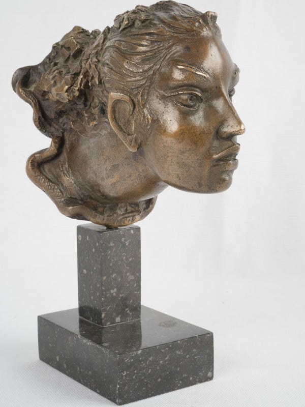Stylized bronze bust on marble base 9"
