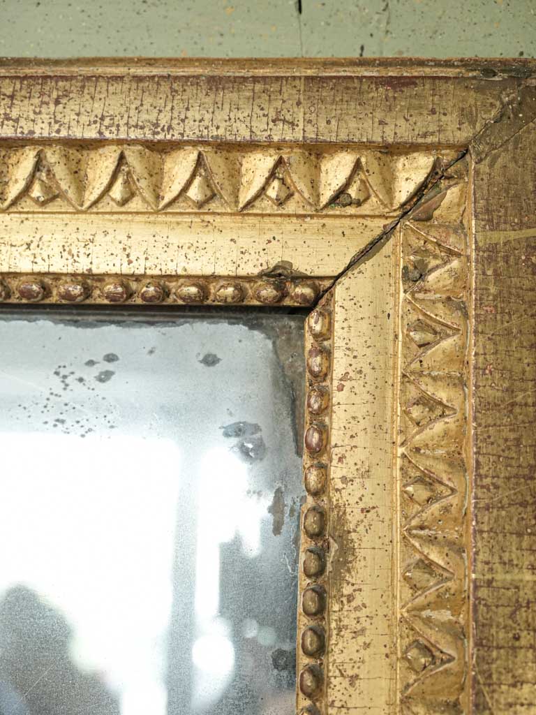 Carved laurel leaf trumeau