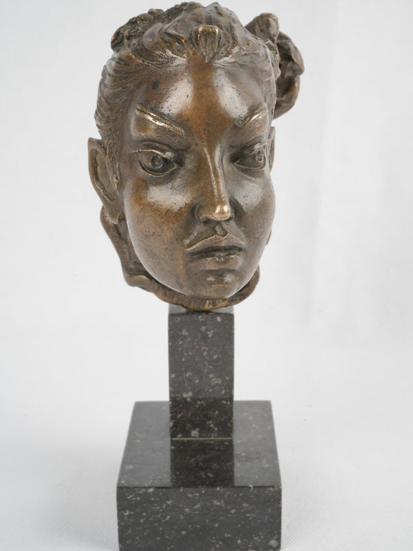 Stylized bronze bust on marble base 9"