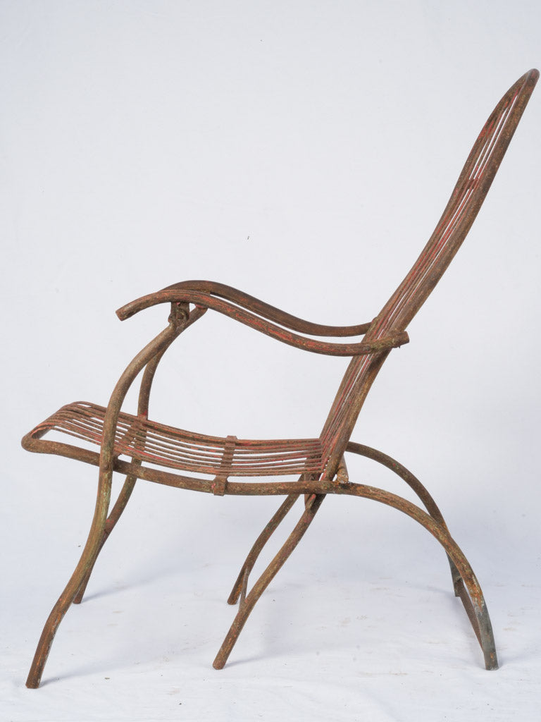 Aged metal folding lawn chair