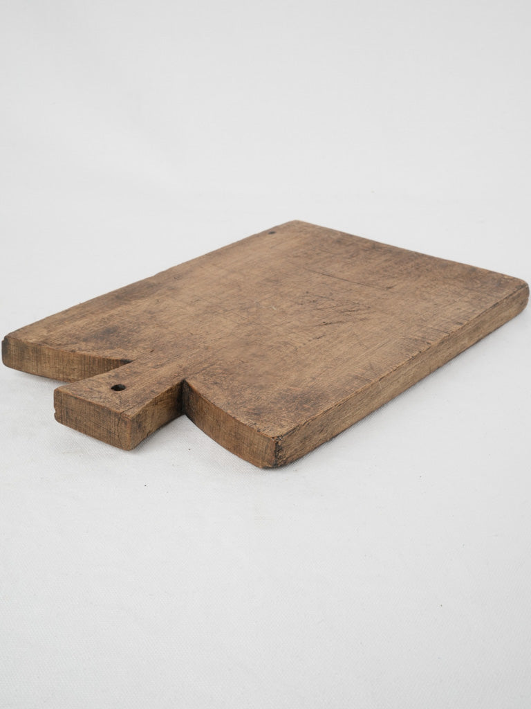 Aged, practical French serving board
