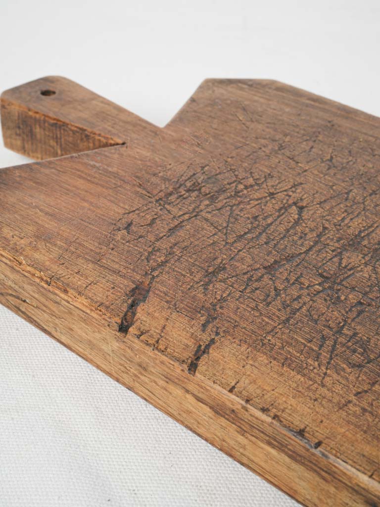 Distinctive timeworn wooden cheese platter