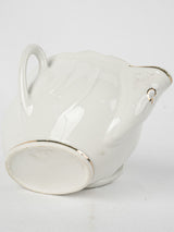 Rare, charming double-sided gravy boat