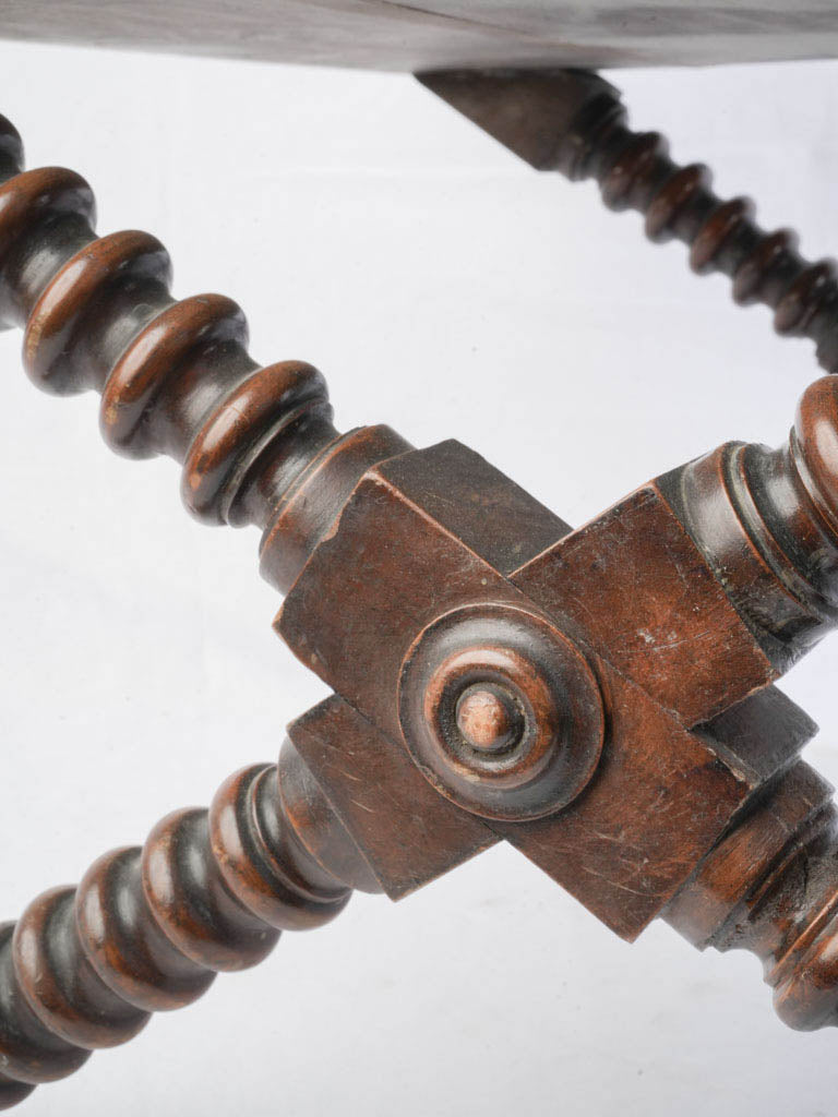 Intricately detailed barley-twist legs  