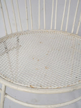 Aged white iron garden chairs
