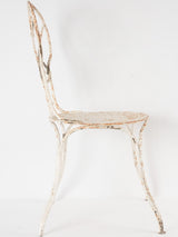Aged French chair with diagonal motif