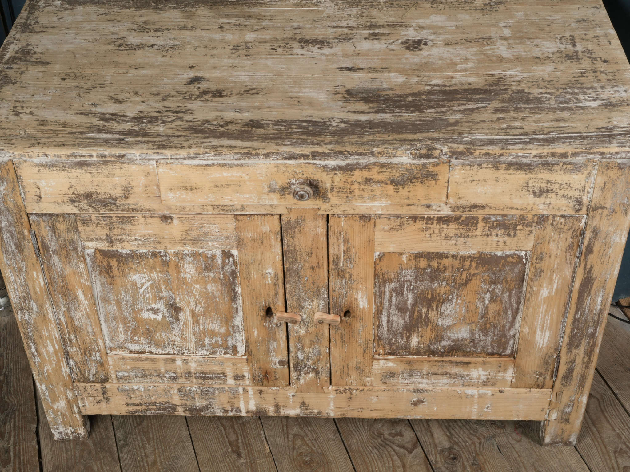 Patinated ochre-toned sideboard  