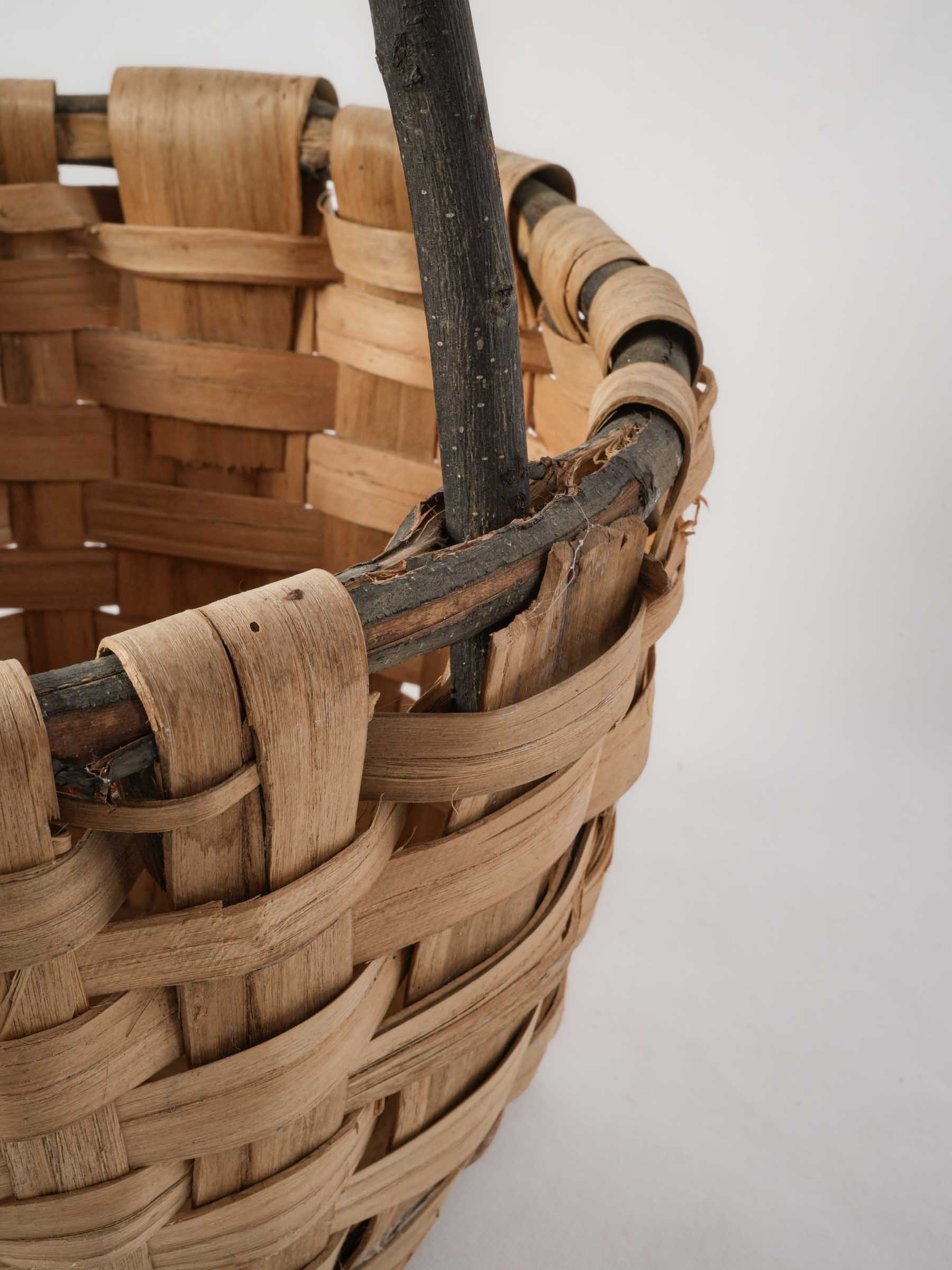 Woven Reed Harvest Basket with Dark Wood Handle