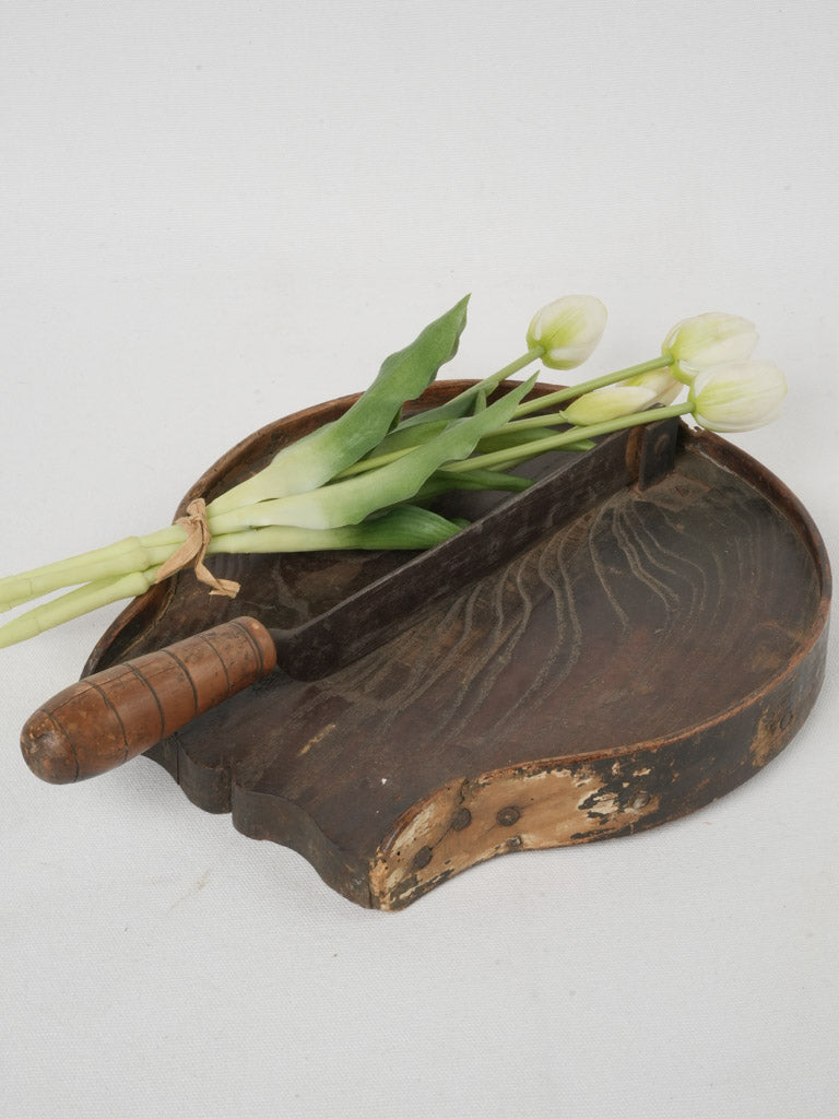 Rustic, historic chocolate cutting tool