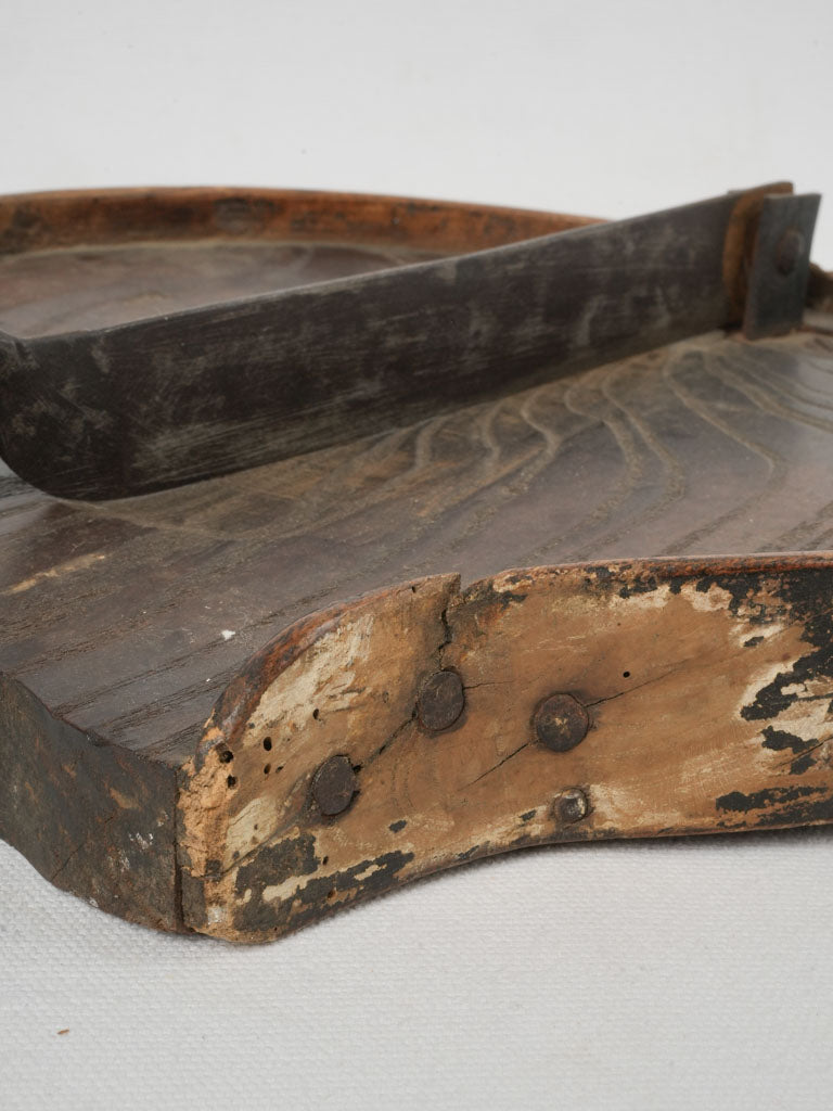 Patinated, antique chocolate slicing utensil