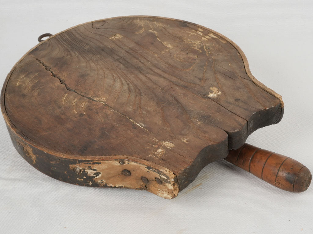 Aged, decorative chocolate cutting implement