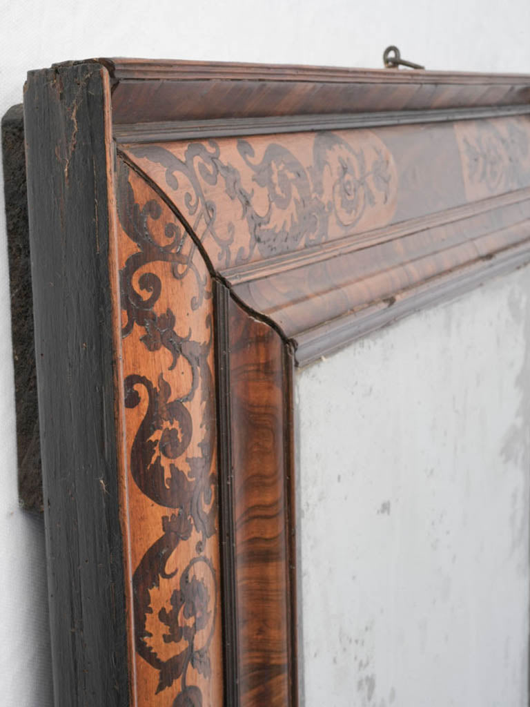 Richly veneered historical mirror