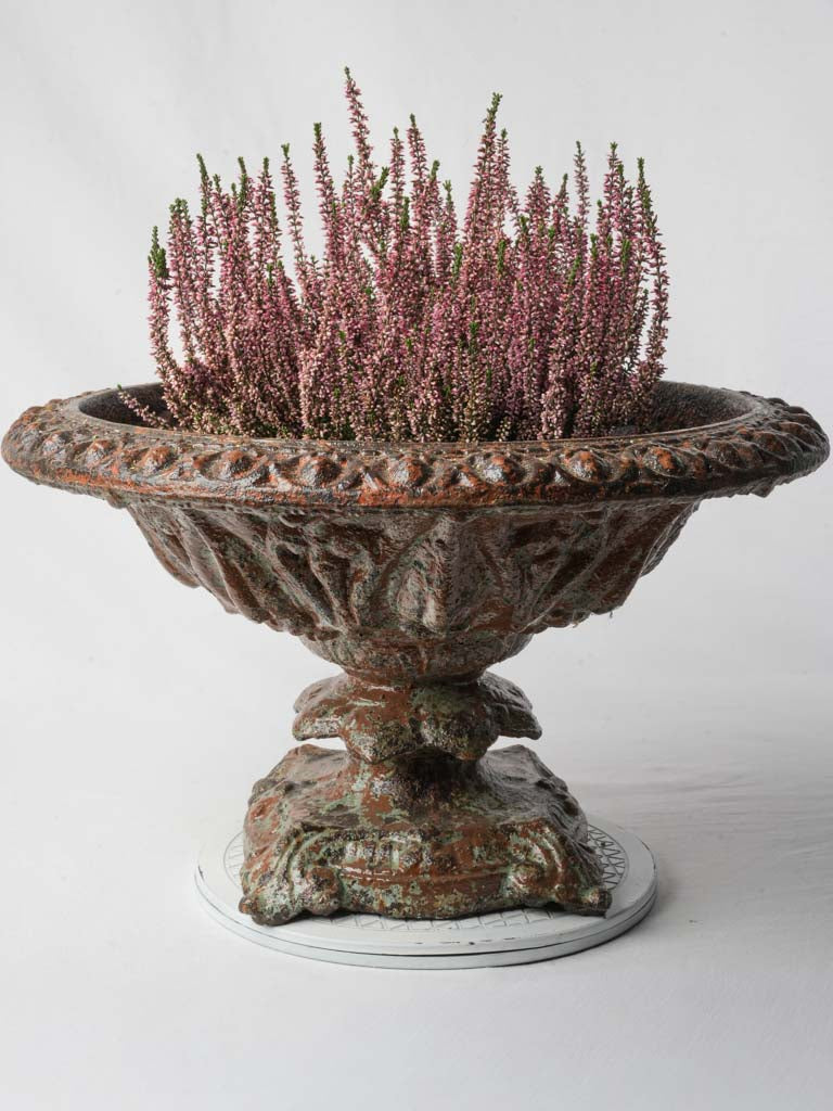 Aged russet-tone cast-iron urn
