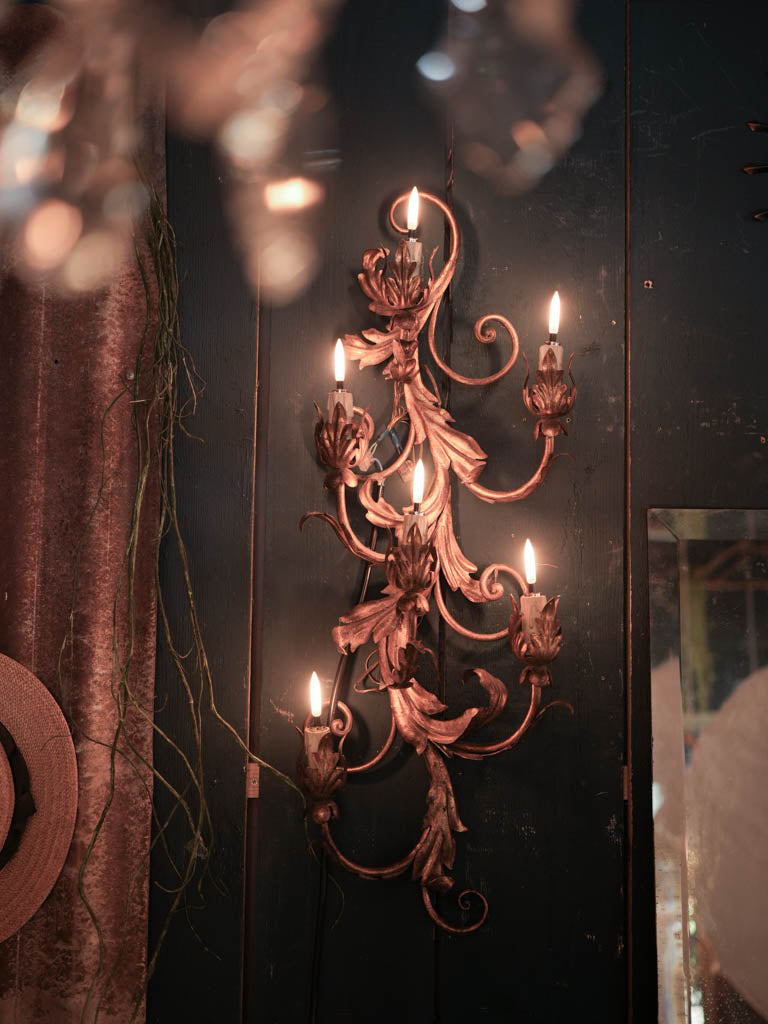 Decorative six-light wall sconces  