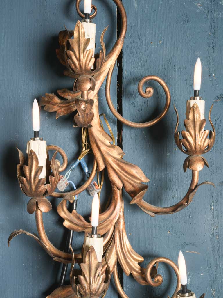 Ornate candle-style socket sconces  