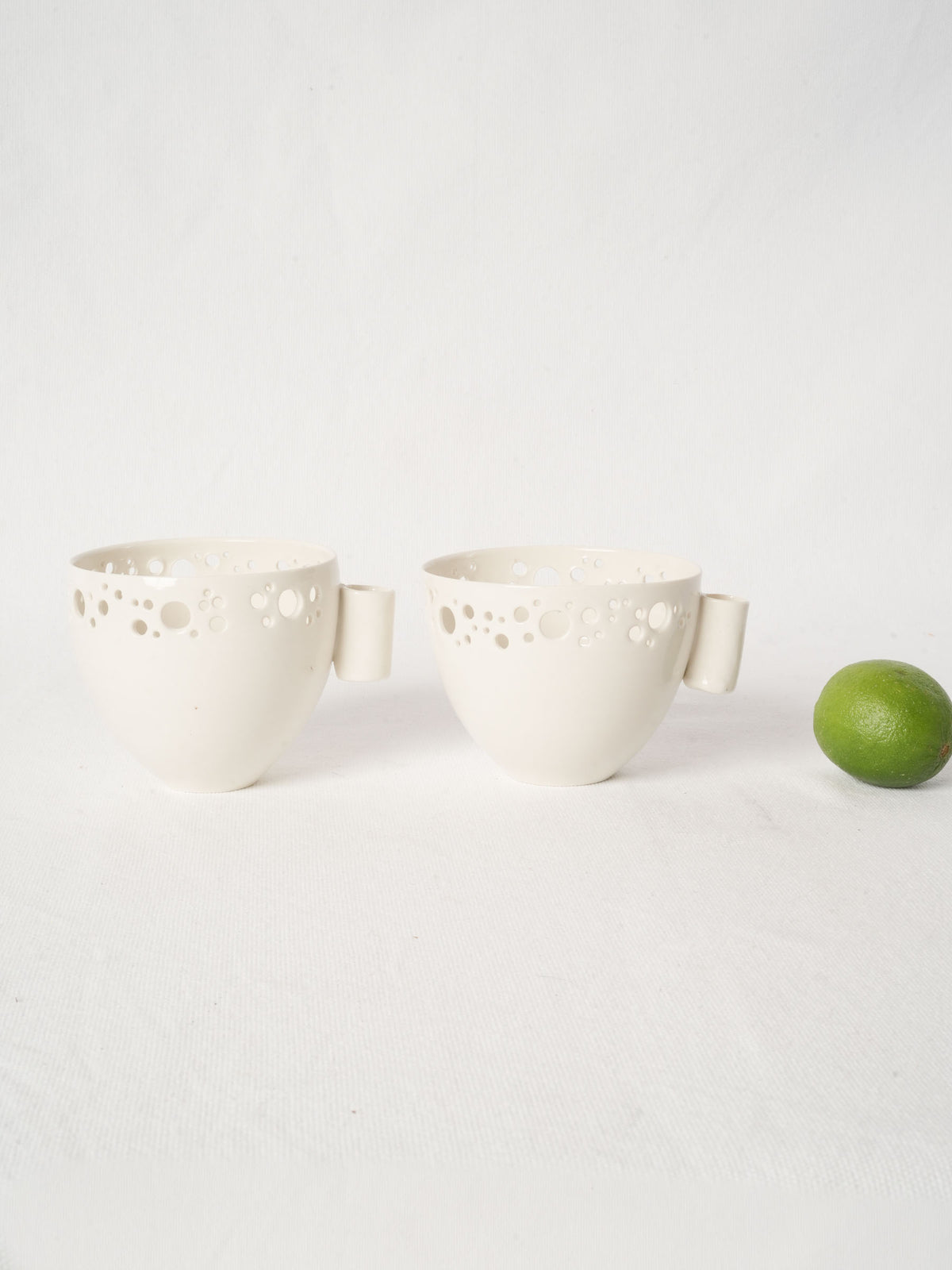 Pair of Handmade Porcelain Olive Bowls with Pierced Rim