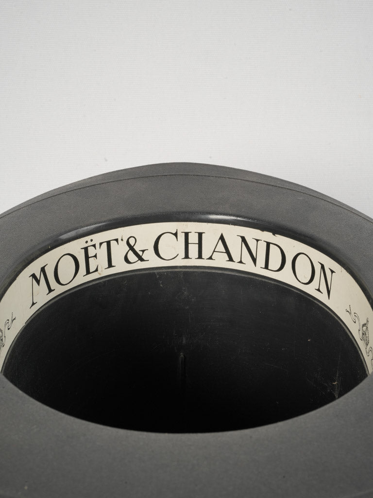 Black plastic top hat bucket