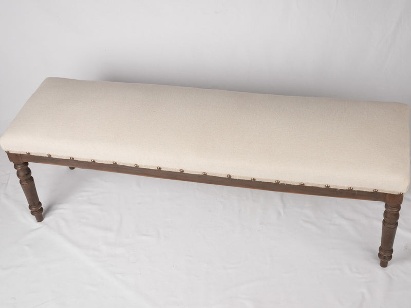 19th century French bench w/ linen upholstery 61¾"