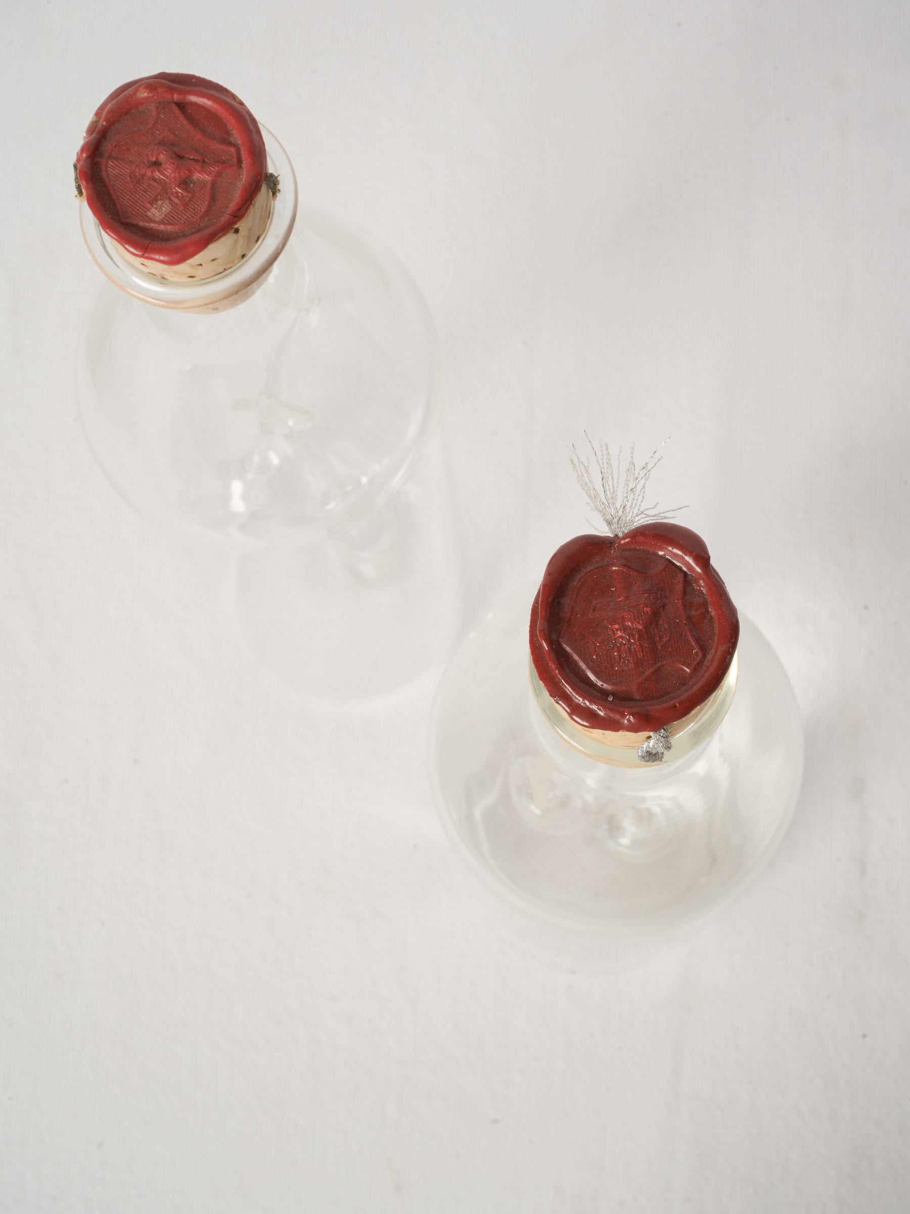 Pair of Swiss Blown Glass Kirsch Carafes with Cherry Sculpture
