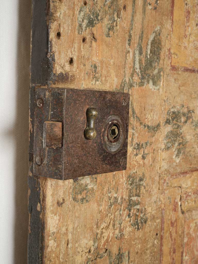 Substantial olive-hued Florentine door
