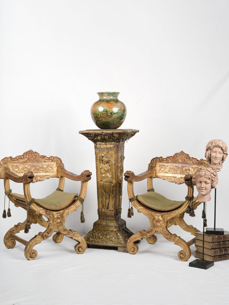 Opulent aged Italian gilded armchairs